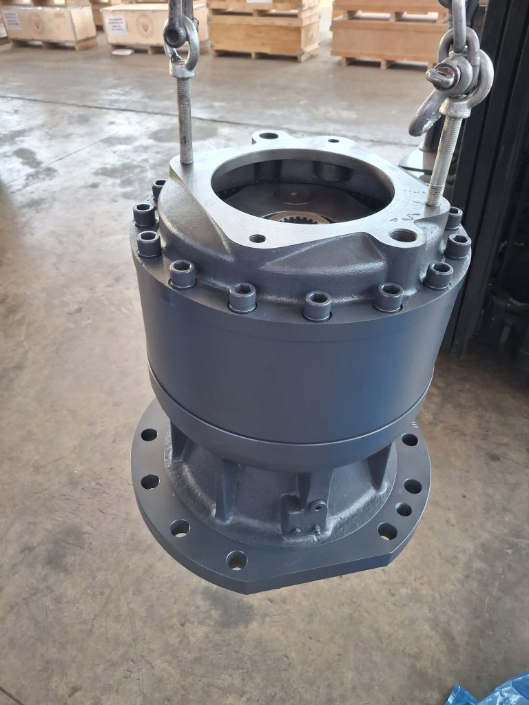 Volvo swing reduction assembly with open housing detail
