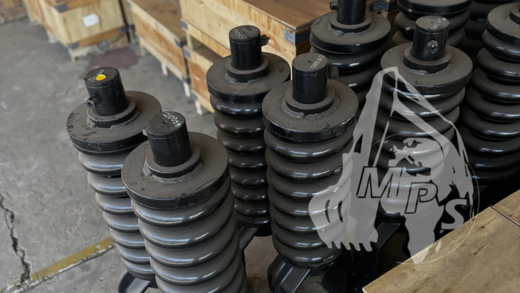 Heavy-duty excavator track adjuster and recoil spring assemblies