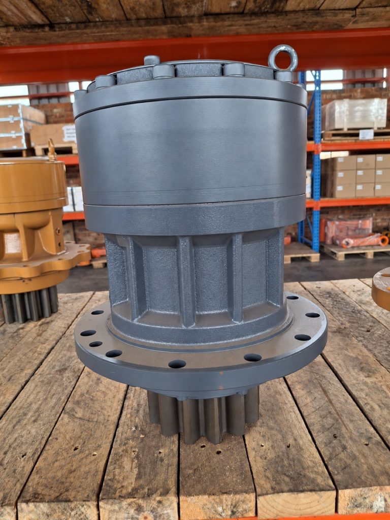 Grey excavator swing reduction assembly in the Mid Plant warehouse